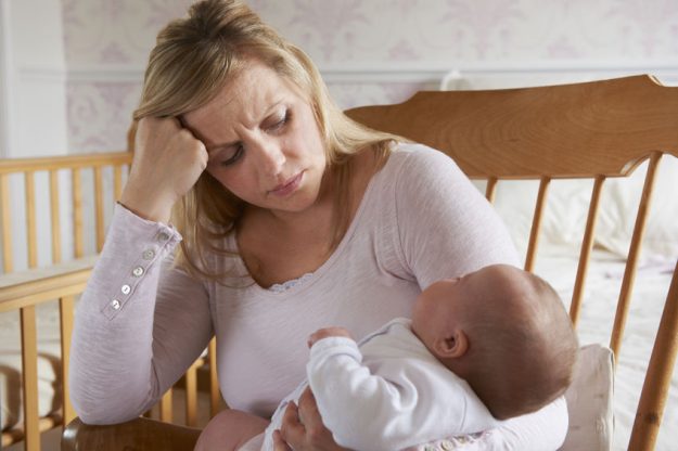 50160690 – tired mother suffering from post natal depression